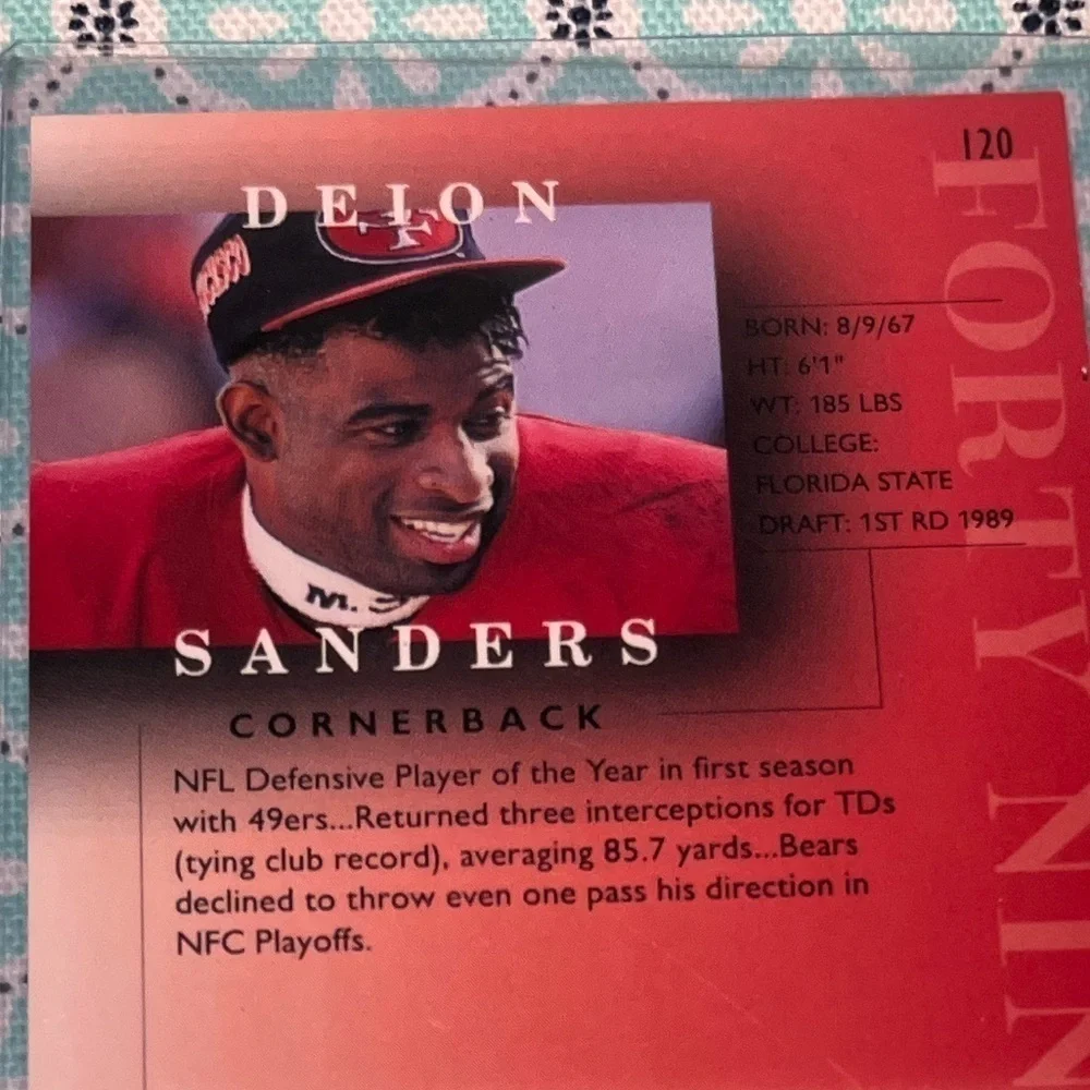 Deion SANDERS 1995 Skybox TRADED Football card #120